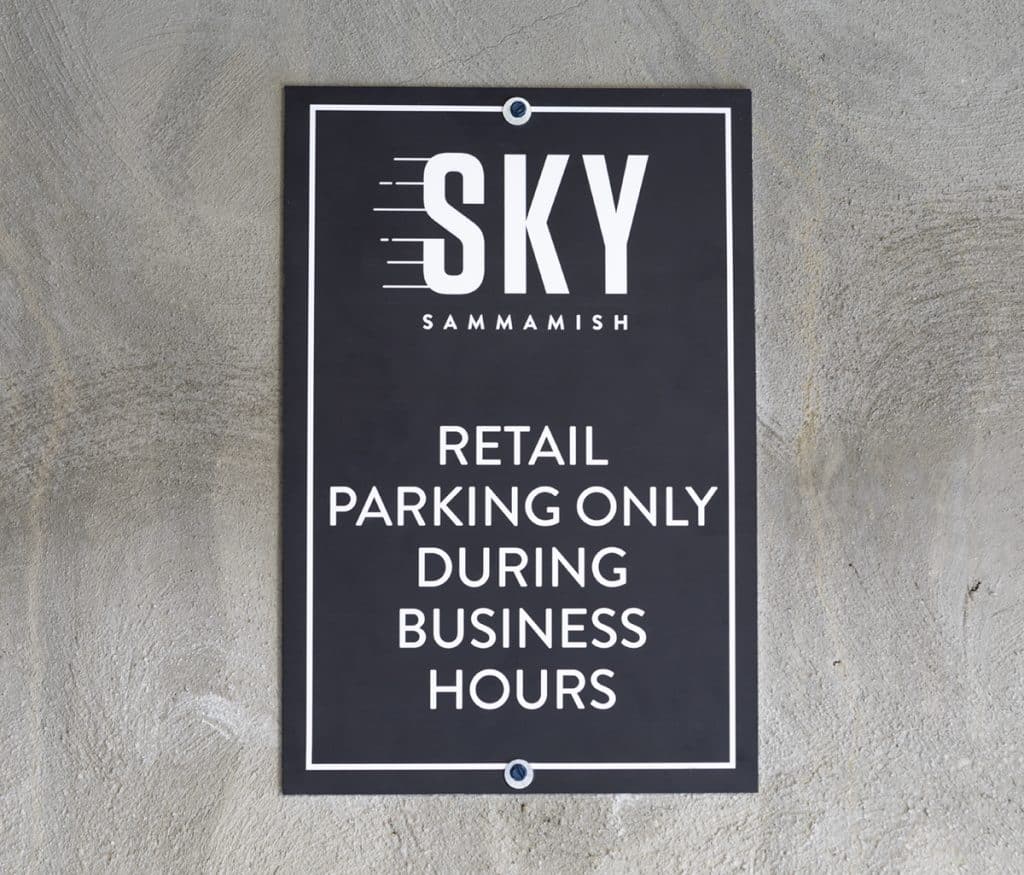 Sign reads: "SKY Sammamish. Retail parking only during business hours.